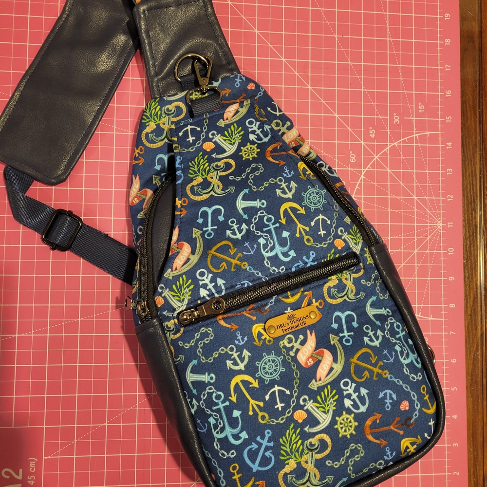 Sling Back Or Front Unisex Bag Featuring "Love Is Love" Theme